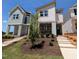 Charming new construction with inviting brick and siding exterior and newly installed front yard landscaping at 330 Cottage Hill Way, Knightdale, NC 27604