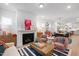 Inviting living room with fireplace, stylish furniture, and open layout at 330 Cottage Hill Way, Knightdale, NC 27604