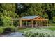 Open air pavilion with picnic table and seating area at 330 Cottage Hill Way, Knightdale, NC 27604