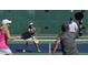 Active pickleball players on a well-maintained outdoor court at 330 Cottage Hill Way, Knightdale, NC 27604