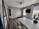 Bright home office with wood floors, large desk, and a white board for brainstorming at 3510 Rawdon Dr, Durham, NC 27713