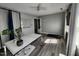 Bright home office with wood floors, large desk, and a white board for brainstorming at 3510 Rawdon Dr, Durham, NC 27713