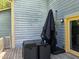 Outdoor patio with an umbrella, a dining set, and siding of home at 3510 Rawdon Dr, Durham, NC 27713