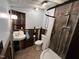 Unique bathroom featuring rustic wood accents and a vintage-style faucet at 358 Pool Rock Shores Ln, Henderson, NC 27537