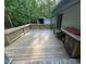 Large rear wood deck at 358 Pool Rock Shores Ln, Henderson, NC 27537