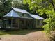 Charming home featuring a gazebo, covered porch and metal roof at 358 Pool Rock Shores Ln, Henderson, NC 27537