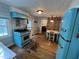Charming vintage kitchen with a retro-style blue stove and refrigerator at 358 Pool Rock Shores Ln, Henderson, NC 27537