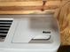 Close up of a wall mounted Amana AC unit at 358 Pool Rock Shores Ln, Henderson, NC 27537