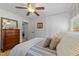 Bedroom features wood flooring, neutral colors, and a dresser at 3620 Arrowwood Dr, Raleigh, NC 27604