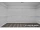 Spacious walk-in closet with carpeted floors and wire shelving provides ample storage solutions for an organized wardrobe at 412 Longleaf Glen Lane, Zebulon, NC 27597