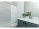 Stylish bathroom features a shower-tub combo with white subway tile and modern vanity at 46 Addison Pond Ct, Zebulon, NC 27597