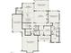Detailed first floor plan showing kitchen, garage, bedrooms, and living spaces at 46 Addison Pond Ct, Zebulon, NC 27597