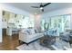 Bright and airy living room seamlessly connecting to kitchen and outdoor patio at 46 Addison Pond Ct, Zebulon, NC 27597