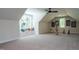 Large bonus room with built-in window seats and multiple musical instruments displayed at 476 Mollie Meadow Dr, Zebulon, NC 27597