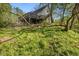 View of backyard with covered deck at 5019 Dorsey Rd, Oxford, NC 27565