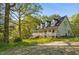 Charming two-story home with inviting front porch and mature tree in yard at 5019 Dorsey Rd, Oxford, NC 27565