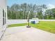 A large backyard boasts a patio, white fence, and storage shed at 514 Bonville Ct, Fuquay Varina, NC 27526