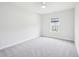 Bedroom with neutral carpet, and a street view at 514 Bonville Ct, Fuquay Varina, NC 27526