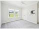 Bedroom with neutral carpet, and a backyard view at 514 Bonville Ct, Fuquay Varina, NC 27526