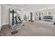A fully equipped gym featuring workout machines and weights at 514 Bonville Ct, Fuquay Varina, NC 27526