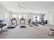 A spacious gym with cardio machines and mirrored walls at 514 Bonville Ct, Fuquay Varina, NC 27526