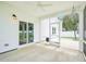 A screened-in patio has concrete flooring and a ceiling fan at 514 Bonville Ct, Fuquay Varina, NC 27526