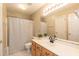 Cozy bathroom with speckled wall paper, decorative sink and standard toilet at 5501 Southern Cross Ave, Raleigh, NC 27606