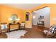 Inviting living room featuring hardwood floors, archways, and a charming decor at 5501 Southern Cross Ave, Raleigh, NC 27606