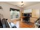 Office with large window, custom cabinets, wood floors, and piano at 5501 Southern Cross Ave, Raleigh, NC 27606