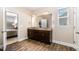 This full bathroom features a double sink vanity and modern fixtures at 59 White Quartz Pl, Fuquay Varina, NC 27526