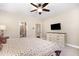 This bedroom includes a TV and dresser for storage and entertainment at 59 White Quartz Pl, Fuquay Varina, NC 27526