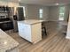 Bright open floor plan with view of kitchen and modern decor at 6300 Nc 27, Coats, NC 27521