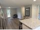Open living area with granite counter island and modern decor at 6300 Nc 27, Coats, NC 27521