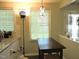Open kitchen dining area with a view of backyard. Features lots of natural light at 8 Woodsprite Ct, Durham, NC 27703