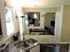 A bright kitchen showcases granite countertops and stainless steel appliances at 8 Woodsprite Ct, Durham, NC 27703