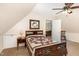 Comfortable bedroom with neutral carpet and ensuite access at 809 Maple Shade Ln, Apex, NC 27502