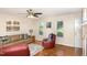 Bright living room offers hardwood floors, ample natural light, and a comfortable layout at 809 Maple Shade Ln, Apex, NC 27502
