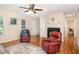 Cozy living room features hardwood floors, a fireplace, and comfortable seating at 809 Maple Shade Ln, Apex, NC 27502