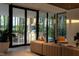Comfortable living room with large sliding glass doors opening to the outdoors, offering seamless transitions at 812 Stradella Rd, Raleigh, NC 27614