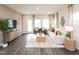 Bright living room featuring modern decor, neutral colors, and stylish furniture arrangement at 817 Ottawa Dr, Garner, NC 27529