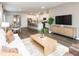 Open-concept living area seamlessly connects living room, dining area and kitchen, offering a spacious and modern design at 817 Ottawa Dr, Garner, NC 27529