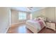 Cozy bedroom features hardwood floors, natural light, and a classic design with charming details at 98102 Drummond, Chapel Hill, NC 27517