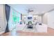 Bright and inviting living room with neutral decor and large windows at 98102 Drummond, Chapel Hill, NC 27517