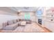 Bright living room features a fireplace, built-in shelves, comfortable seating, and natural light at 98102 Drummond, Chapel Hill, NC 27517