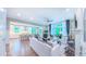 Open concept living room showcasing modern decor and seamless flow to the kitchen at 98102 Drummond, Chapel Hill, NC 27517