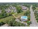 Community aerial view of houses, a pool, and a playground, showcasing the amenities and layout of the community at 1008 Justice Walk Ave, Morrisville, NC 27560