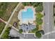 The aerial view shows a community pool, a playground, and a clubhouse, offering a range of leisure and social activities at 1008 Justice Walk Ave, Morrisville, NC 27560
