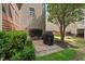 Paver patio near the home features a built-in grill area, perfect for outdoor cooking and entertaining at 1008 Justice Walk Ave, Morrisville, NC 27560