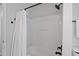 Bright bathroom with a white shower and tub combination, plus modern fixtures at 1008 Justice Walk Ave, Morrisville, NC 27560