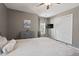 Comfortable bedroom with carpet, stylish gray walls, and a ceiling fan at 1008 Justice Walk Ave, Morrisville, NC 27560